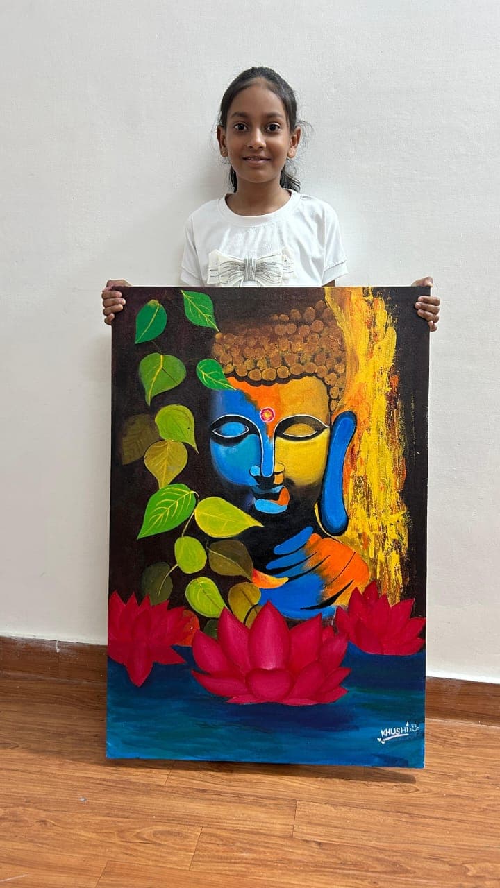 Khushi holding her Buddha painting with lotus flowers and Bodhi leaves