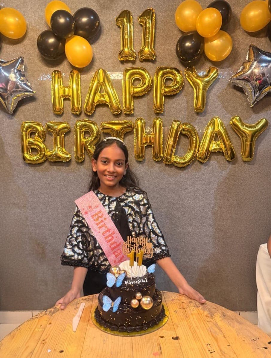 Khushi with her 11th birthday cake