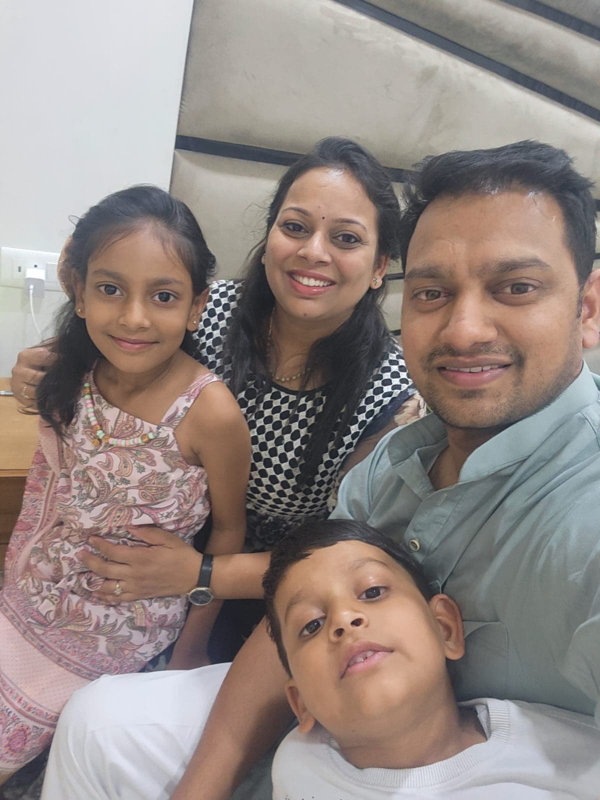 Khushi with Mom Prachi, Dad Sachin, and little brother Arnav - a happy family selfie