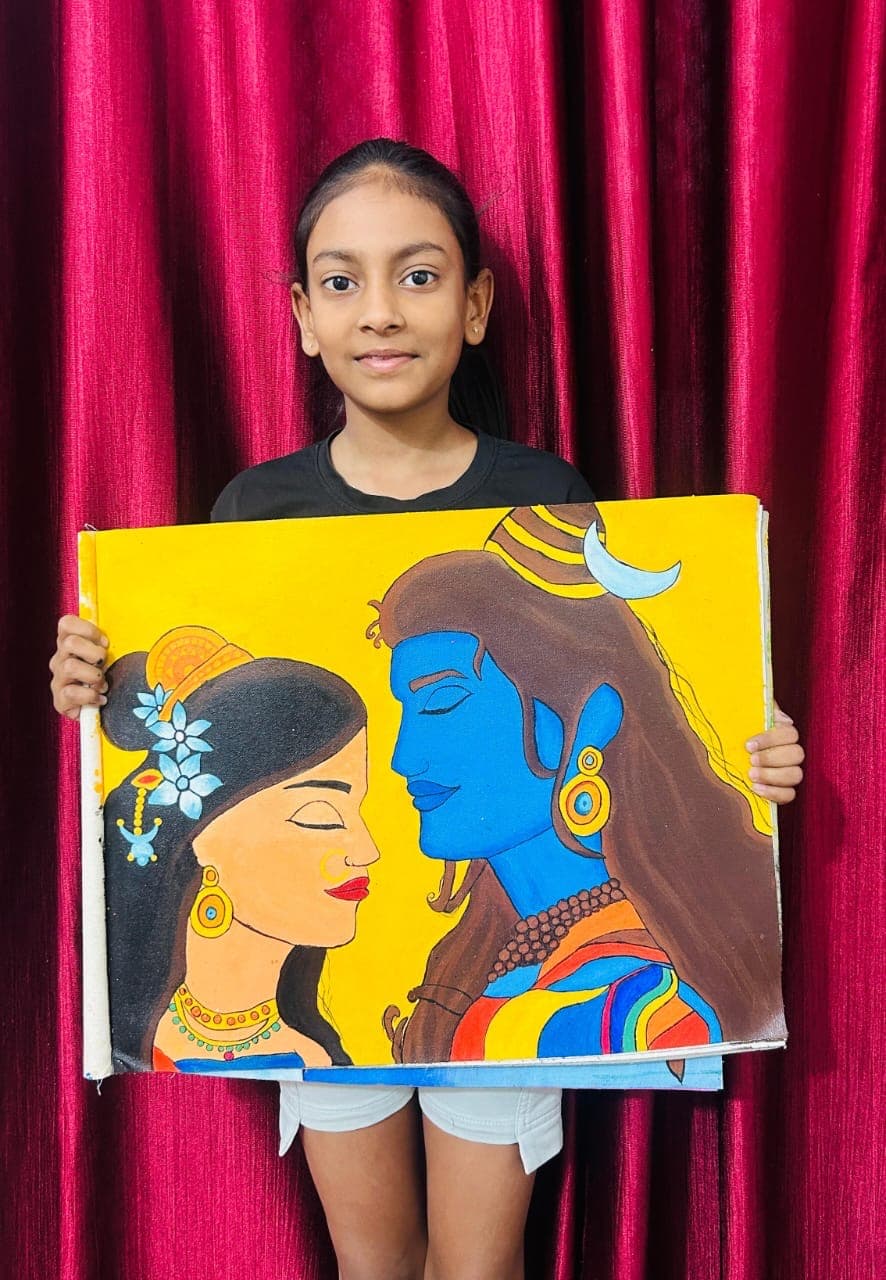 Khushi holding her Shiva and Parvati painting
