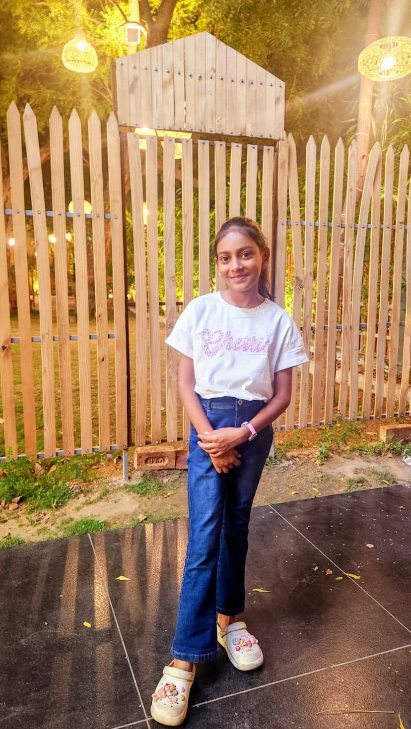 Khushi standing outdoors