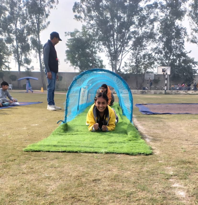 Khushi at sports day tunnel crawl