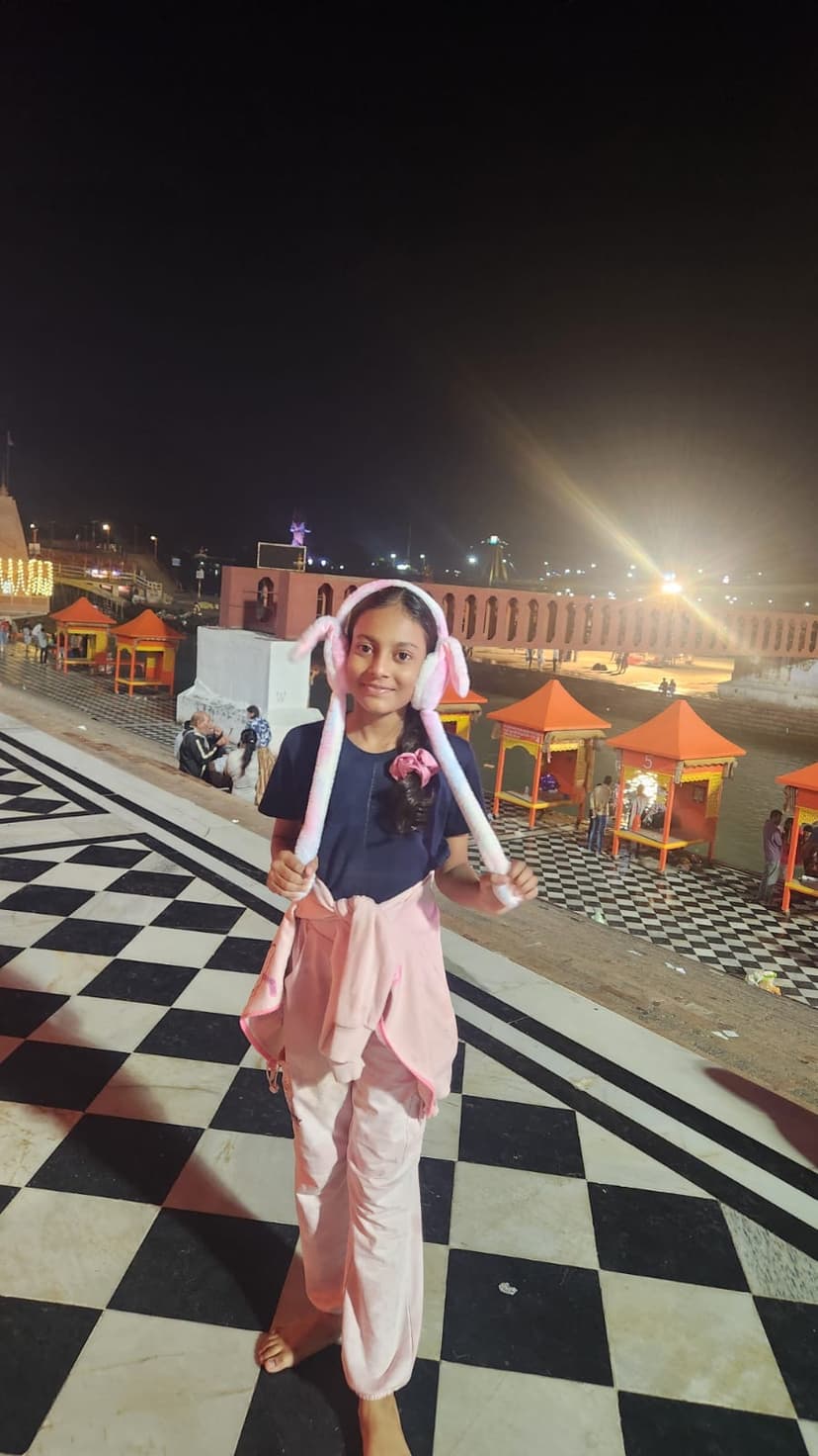 Khushi at temple at night